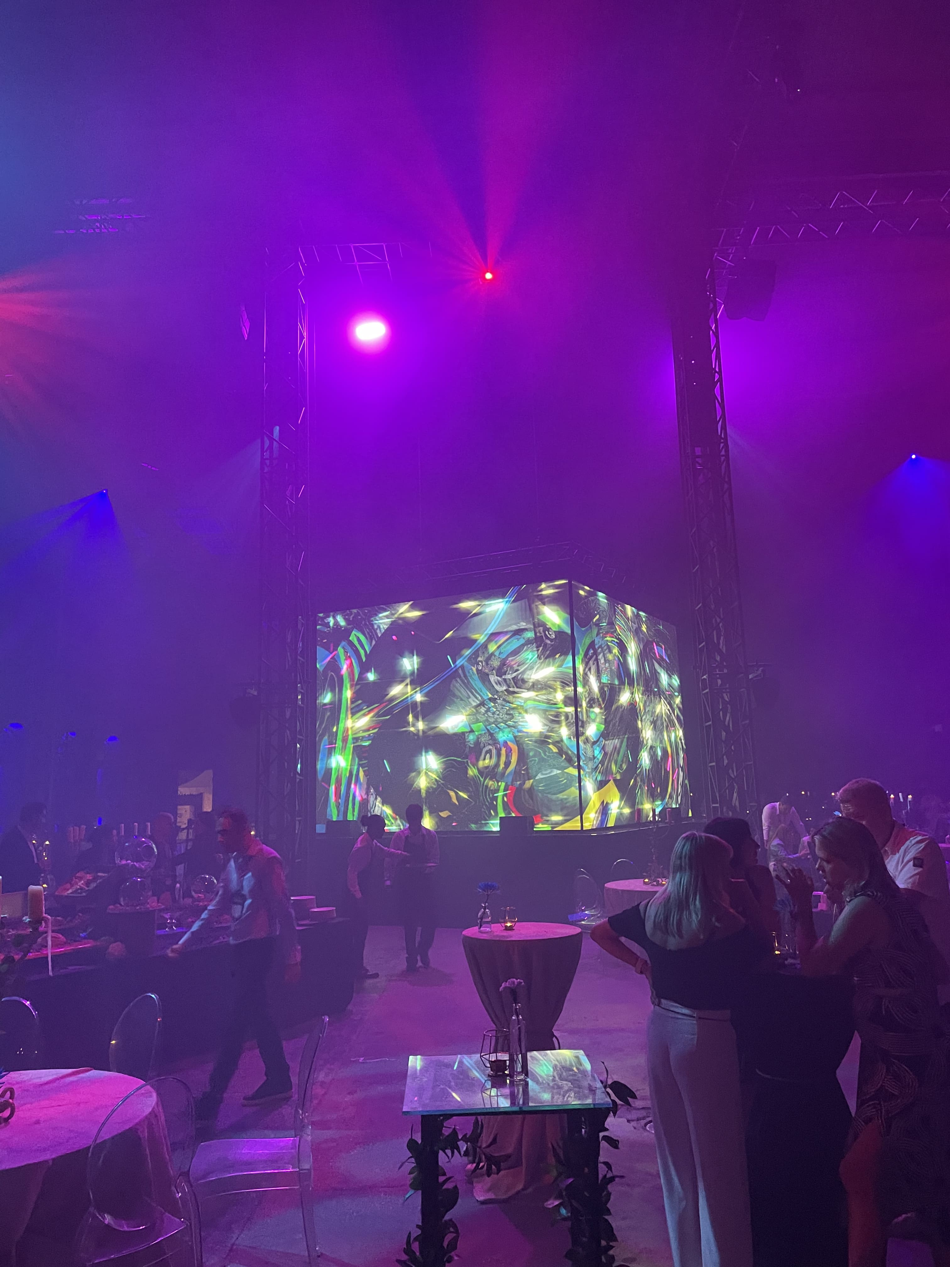 Immersive party with LED cube and purple haze