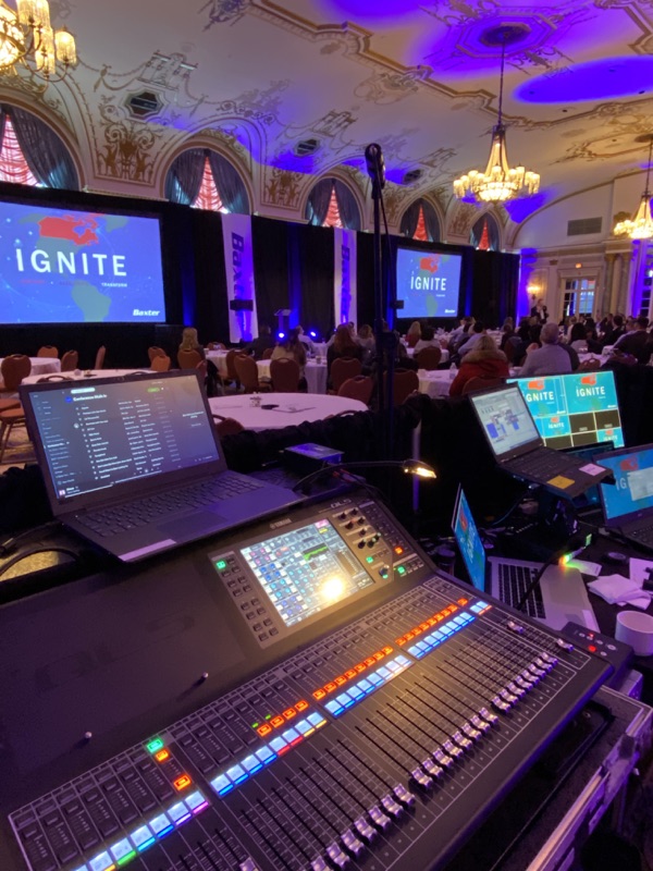 Audio mixing console at a Baxter corporate event